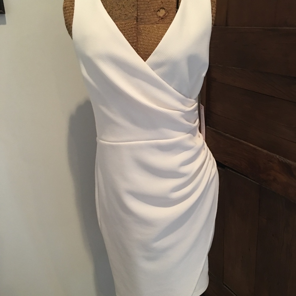 White ruched asymmetrical dress.